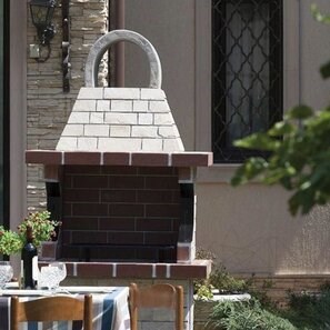 Piccolo barbecue mediterraneo da giardino (Carbone/Legno, 100x60x210 cm, pietra naturale Rhodos, mattone)