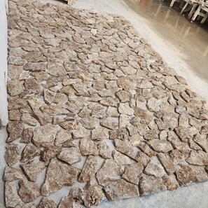 Rivestimento esterno in Travertino Rock Face Noce a lastre irregolari